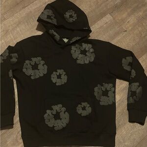 Black on Black Denim Tears Hoodie size Medium in men’s.